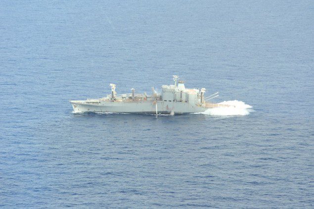 The ex-USS Kilauea being blown away