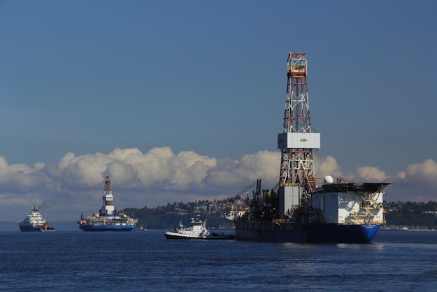 In June 2012, the Kulluk semi-submersible, left, towed by the Aiviq followed by Noble’s drillship, Discoverer left Seattle with high hopes discovering oil on the North Slope of Alaska this summer. Photo: Vigor