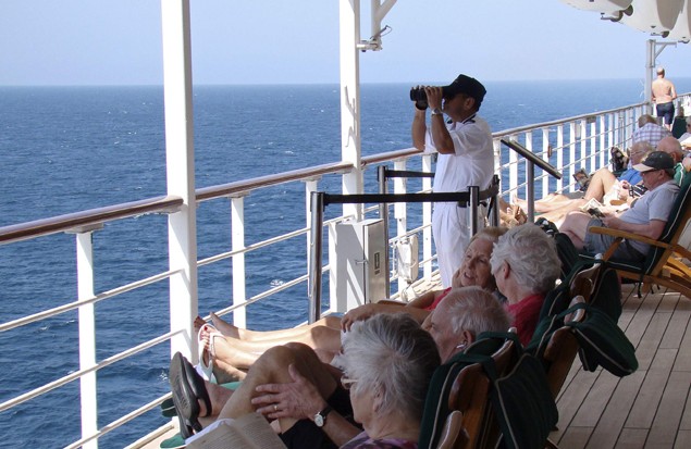 A watchkeeper is seen on the deck of Queen Mary 2 in the Southern Red Sea January 24, 2013. (c) REUTERS/Eva Tomsic
