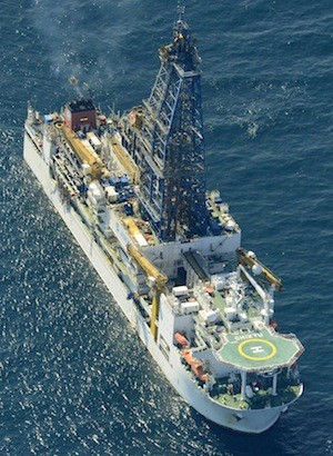 An aerial view shows deep-sea drilling vessel "Chikyu" in the Pacific, off Aichi Prefecture, central Japan, in this photo taken by Kyodo March 12, 2013. A Japanese energy explorer said on Tuesday it extracted gas from offshore methane hydrate deposits for the first time in the world, as part of an attempt to achieve commercial production within six years. Since 2001, Japan, which imports nearly all of its energy needs, has invested several hundred million dollars in developing technology to tap methane hydrate reserves off its coast that are estimated to be equal to about 11 years of gas consumption. Mandatory Credit. REUTERS/Kyodo (JAPAN - Tags: ENERGY ENVIRONMENT MARITIME) ATTENTION EDITORS - THIS IMAGE WAS PROVIDED BY A THIRD PARTY. FOR EDITORIAL USE ONLY. NOT FOR SALE FOR MARKETING OR ADVERTISING CAMPAIGNS. THIS PICTURE IS DISTRIBUTED EXACTLY AS RECEIVED BY REUTERS, AS A SERVICE TO CLIENTS. MANDATORY CREDIT. JAPAN OUT. NO COMMERCIAL OR EDITORIAL SALES IN JAPAN. YES