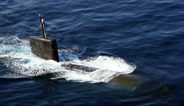 Nov. 11, 2007. The Los Angeles-class nuclear-powered fast-attack submarine USS Miami (SSN 755) surfaces in the North Arabian Sea during an anti-submarine warfare (ASW) exercise with the Enterprise Carrier Strike Group. U.S. Navy photo by Lt. Scott Miller
