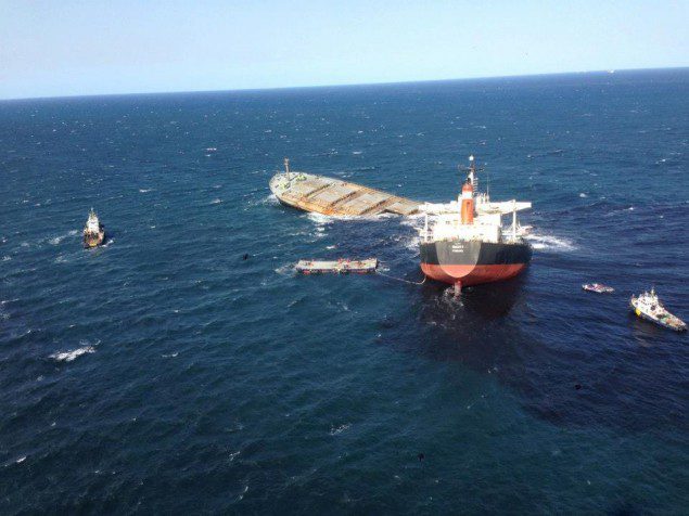 The plume of coal coming from the grounded MV SMART is easily visible in this photo provided by Subtech Group.
